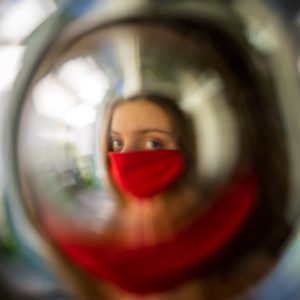 girl in red mask in bubble